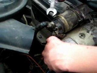 two girls repairing a starter